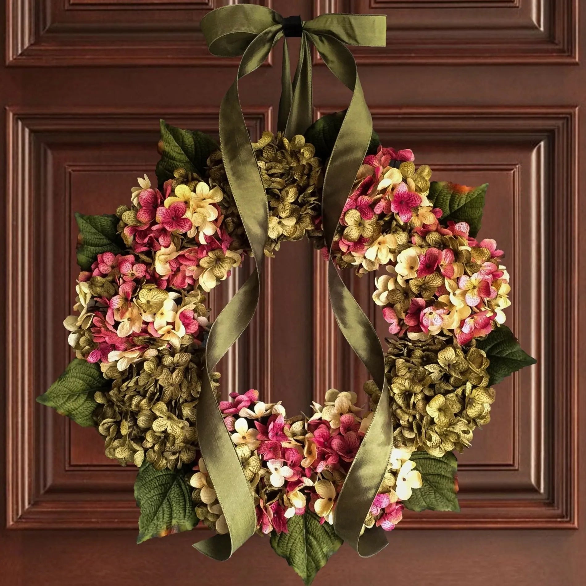 spring and summer hydrangea door wreath on wood door
