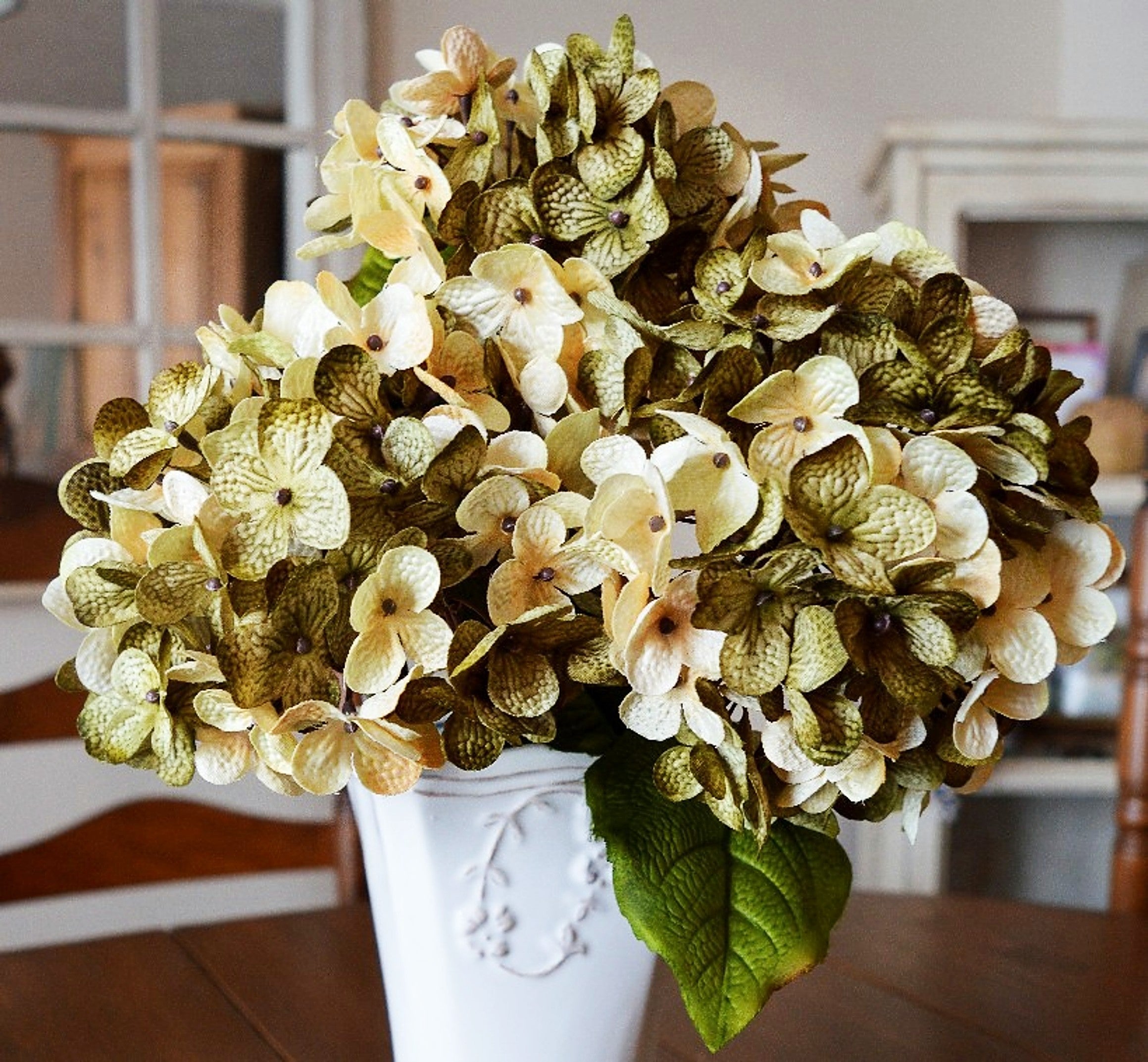 artificial hydrangea flowers green cream closeup