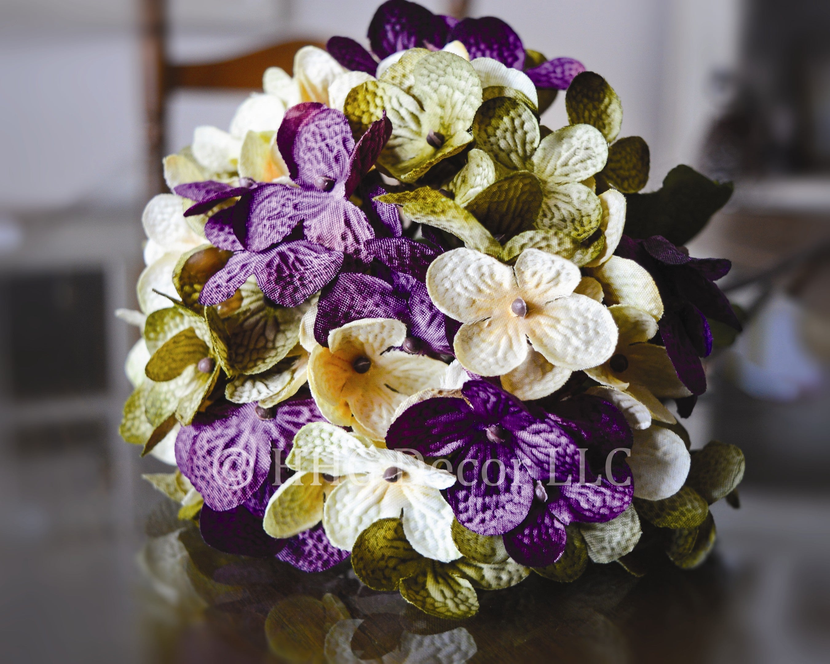 artificial hydrangea flowers purple green cream closeup