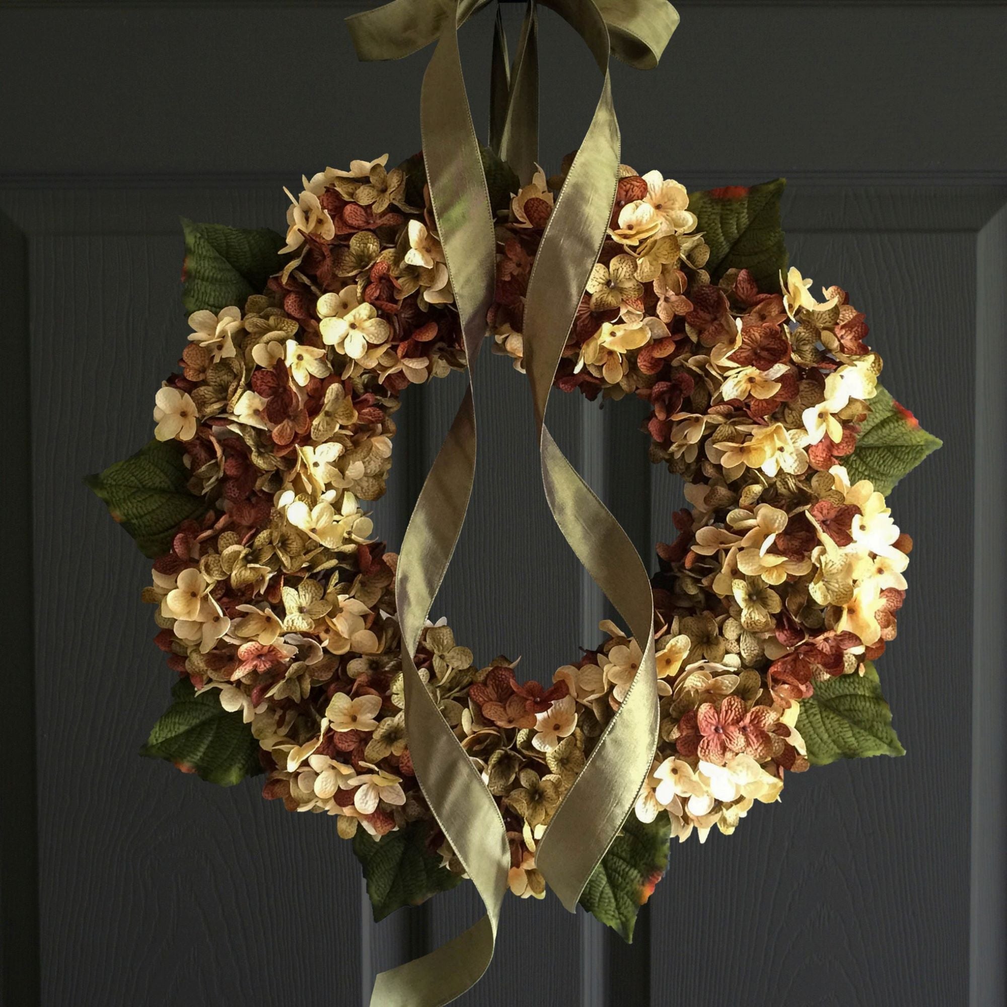 Fall hydrangea wreath in brown green and cream on front door