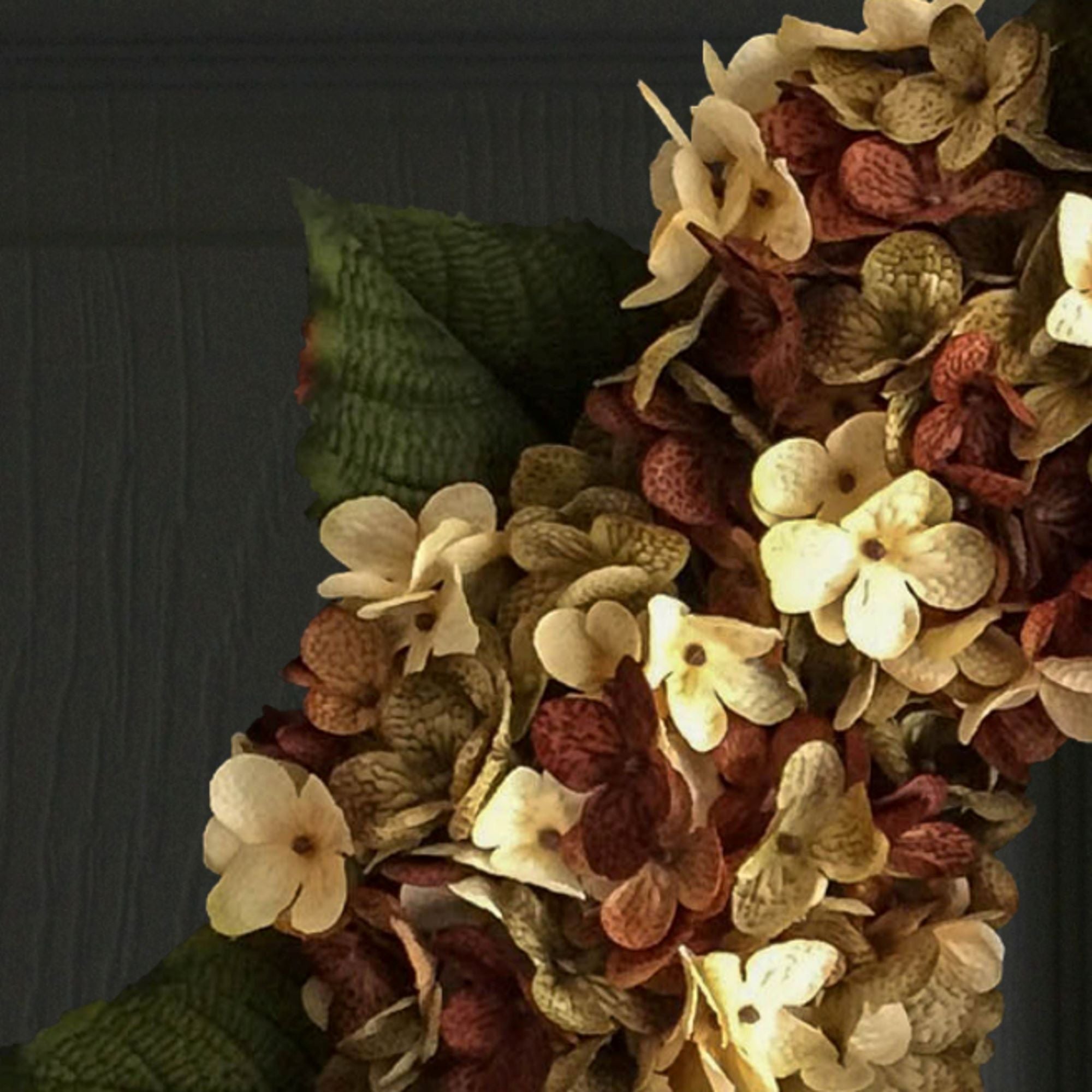Close up of brown green cream hydrangea fall wreath