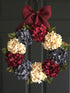 Patriotic hydrangea wreath with red white and blue flowers on grapevine base