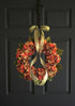 fall hydrangea wreath on dark door
