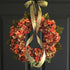 fall hydrangea wreath on dark door