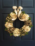 green hydrangea door wreath on front door