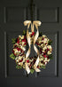 Christmas wreath on black door