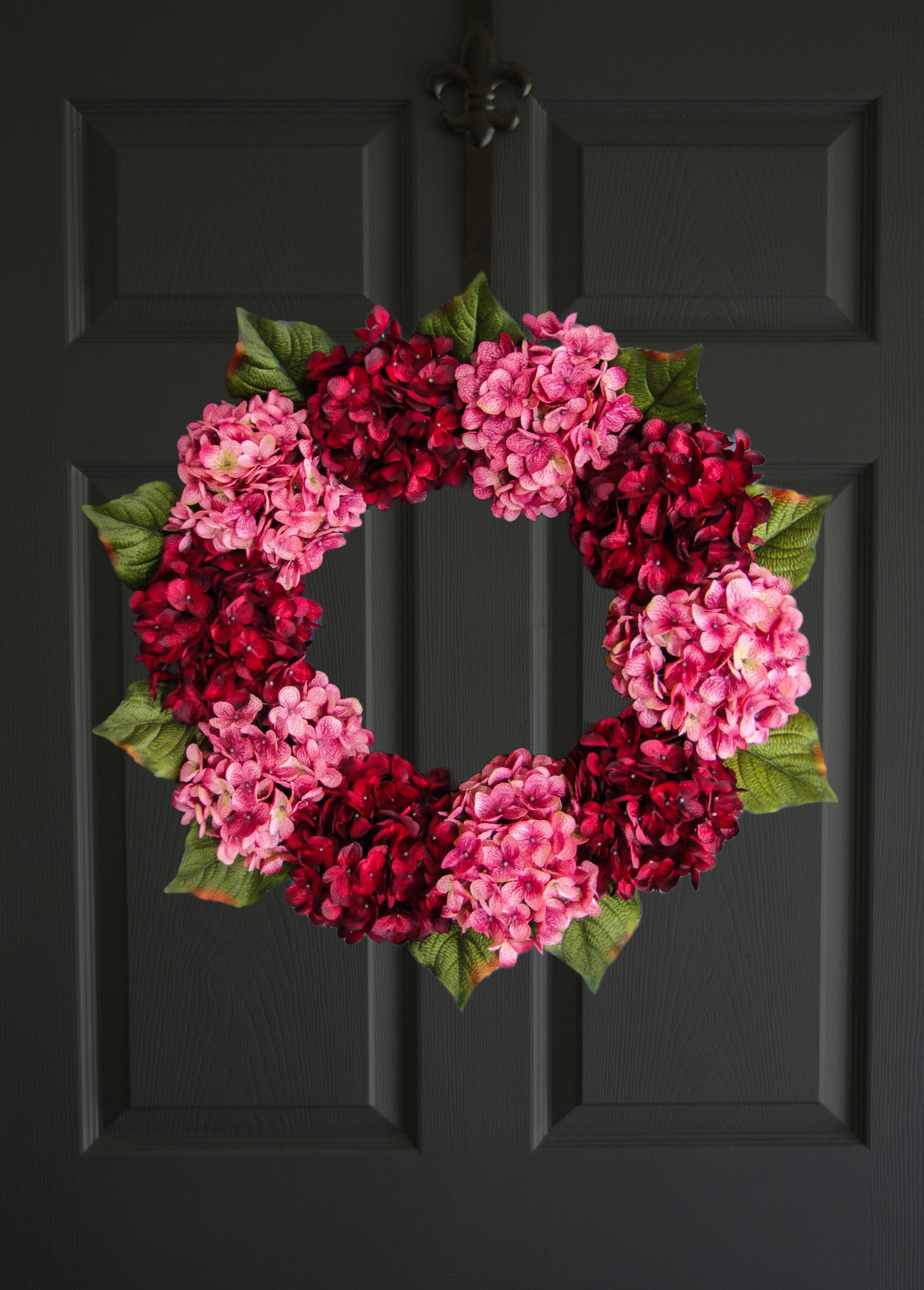 pink and red hydrangea wreath on front door